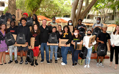 UM First Star Academy Surprised Foster Teens with Laptops and Opportunity in Partnership with T-ROC and One Laptop Per Child
